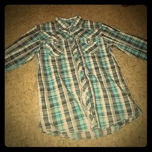 Im selling a blue,black, and white plad shirt